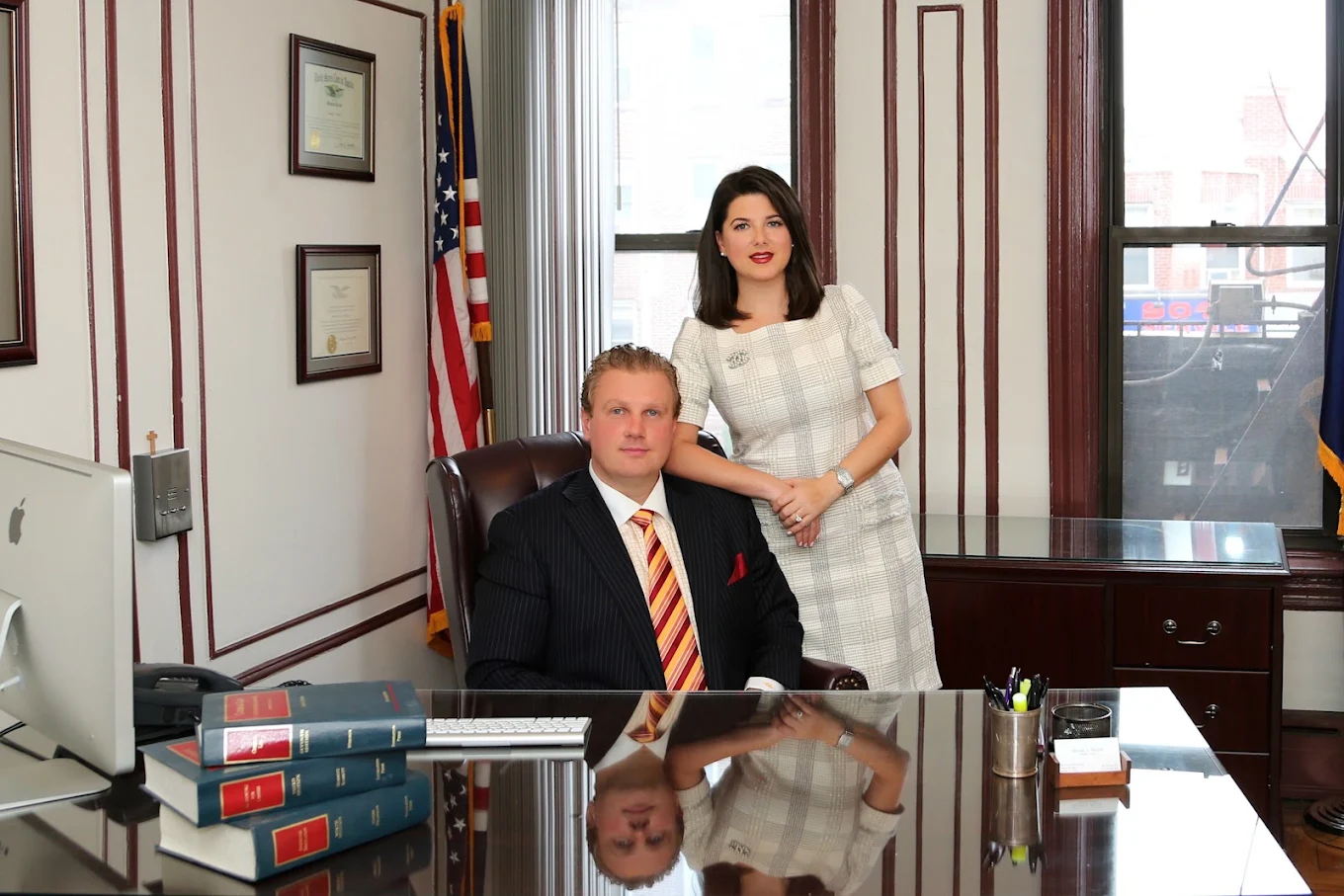 A Brooklyn law office reception and consultation setting where clients meet their attorney